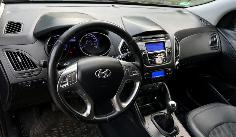 HYUNDAI ix35  | FWD (przód) | Manualna | 114 KM | Czarny full