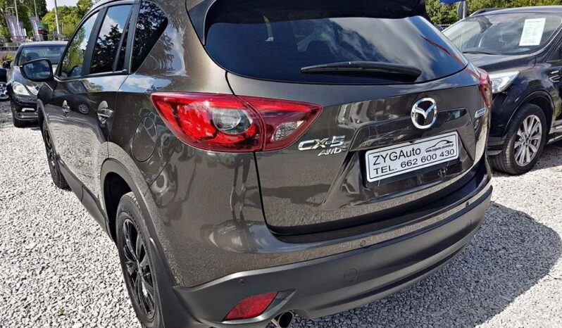 MAZDA CX-5  | 4×4 (doł. automatycznie) | Automatyczna | 160 KM | Brązowy full