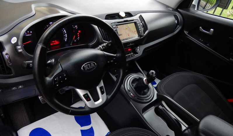 KIA Sportage  | FWD (przód) | Manualna | 135 KM | Srebrny full