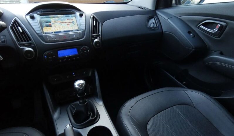 HYUNDAI ix35  | FWD (przód) | Manualna | 135 KM | Brązowy full
