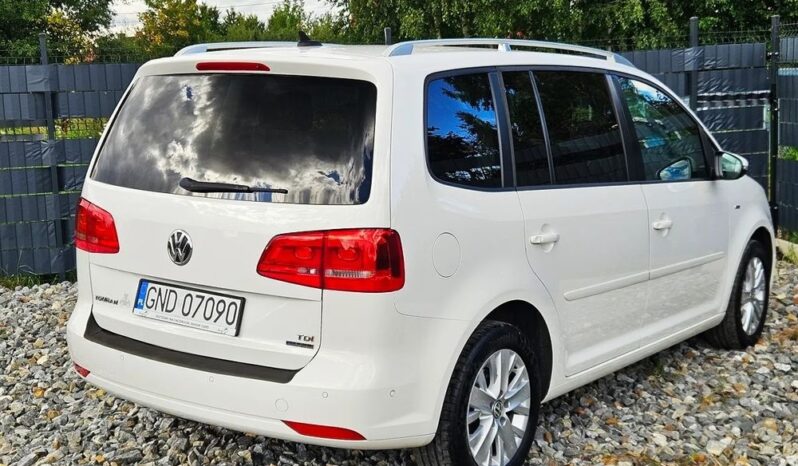 VOLKSWAGEN Touran  | FWD (przód) | Manualna | 105 KM | Biały full