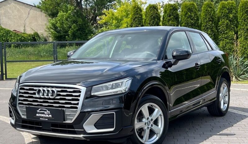 AUDI   Q2     116 KM    Manualna    FWD (przód)    Czarny full