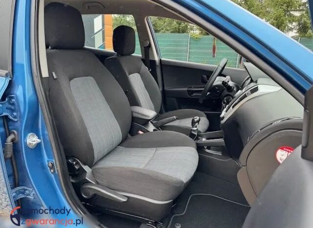 KIA Ceed  | FWD (przód) | Manualna | 90 KM | Niebieski full