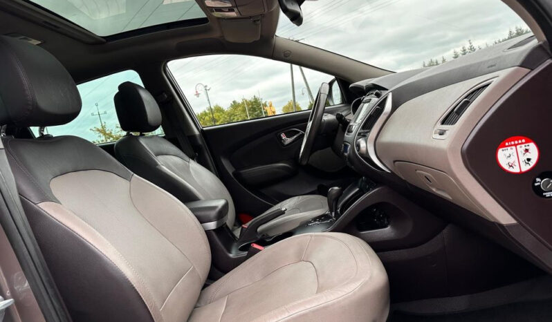 HYUNDAI ix35  | 4×4 (doł. automatycznie) | Automatyczna | 184 KM | Brązowy full