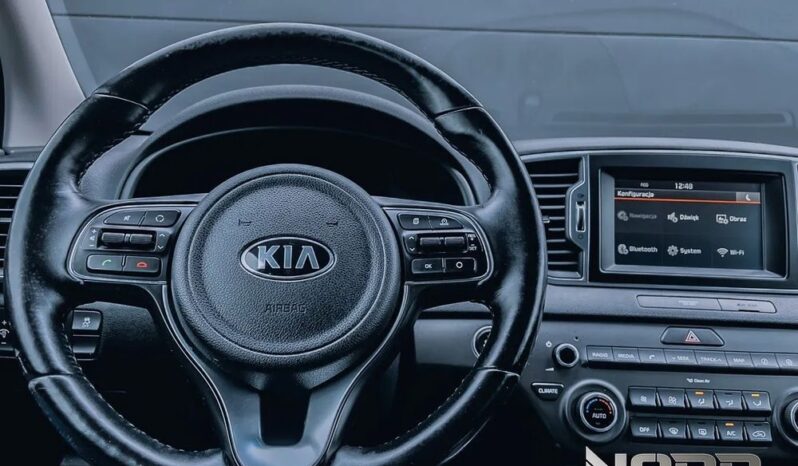 KIA Sportage  | FWD (przód) | Manualna | 115 KM | Srebrny full
