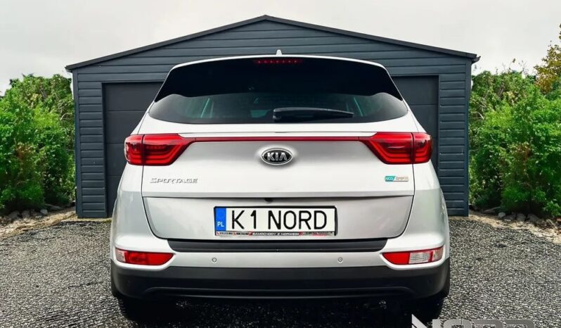 KIA Sportage  | FWD (przód) | Manualna | 115 KM | Srebrny full