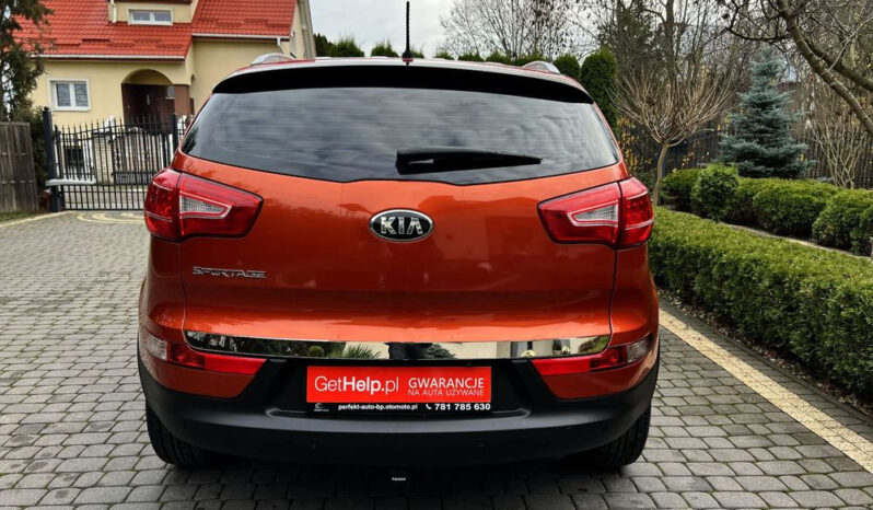 KIA Sportage  | 4×4 (stały) | Manualna | 163 KM | Pomarańczowy full
