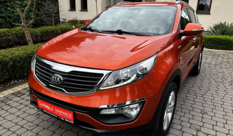 KIA Sportage  | 4×4 (stały) | Manualna | 163 KM | Pomarańczowy full