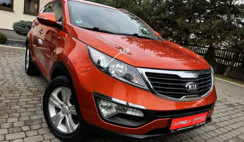 KIA Sportage  | 4×4 (stały) | Manualna | 163 KM | Pomarańczowy full