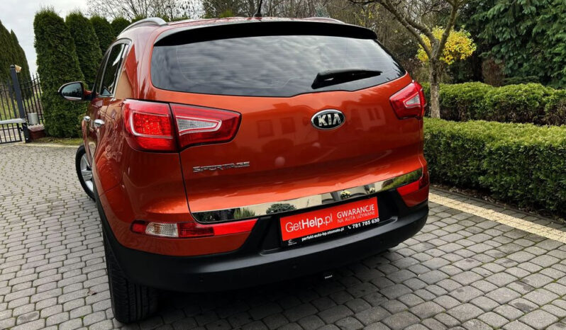 KIA Sportage  | 4×4 (stały) | Manualna | 163 KM | Pomarańczowy full