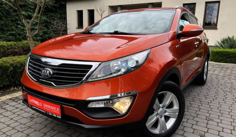 KIA Sportage  | 4×4 (stały) | Manualna | 163 KM | Pomarańczowy full