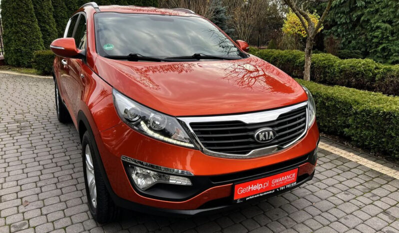 KIA Sportage  | 4×4 (stały) | Manualna | 163 KM | Pomarańczowy full
