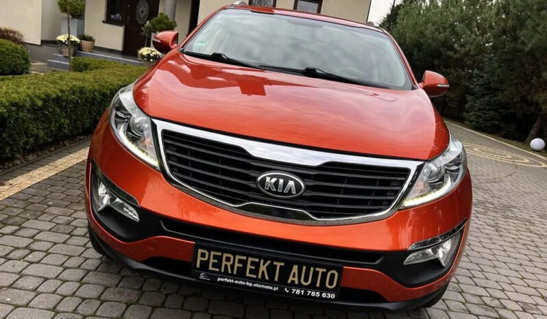KIA Sportage  | 4×4 (stały) | Manualna | 163 KM | Pomarańczowy full