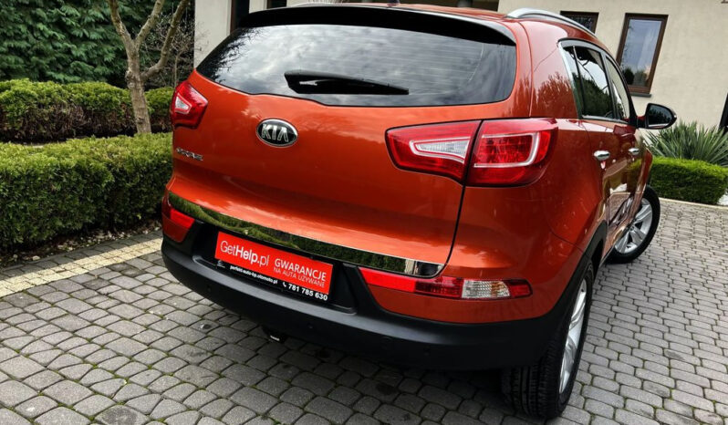 KIA Sportage  | 4×4 (stały) | Manualna | 163 KM | Pomarańczowy full