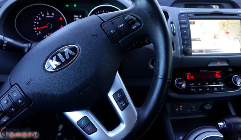 KIA Sportage  | 4×4 (doł. automatycznie) | Automatyczna | 184 KM | Szary full