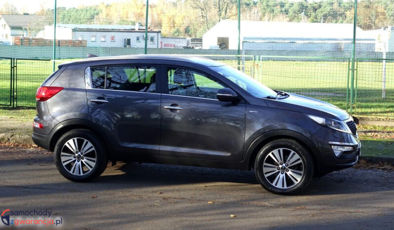 KIA Sportage  | 4×4 (doł. automatycznie) | Automatyczna | 184 KM | Szary full
