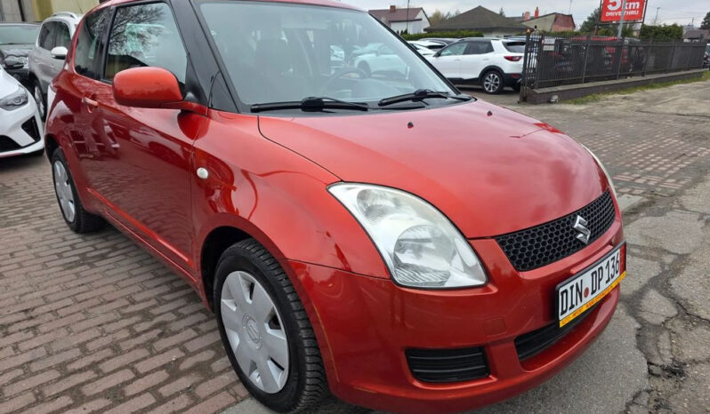 SUZUKI Swift  | FWD (przód) | Manualna | 92 KM | Pomarańczowy full