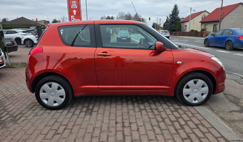 SUZUKI Swift  | FWD (przód) | Manualna | 92 KM | Pomarańczowy full