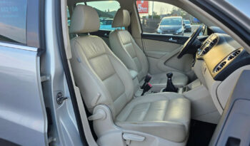 VOLKSWAGEN Tiguan  | FWD (przód) | Manualna | 140 KM | Srebrny full