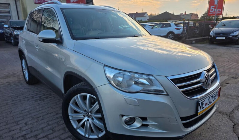 VOLKSWAGEN Tiguan  | FWD (przód) | Manualna | 140 KM | Srebrny full