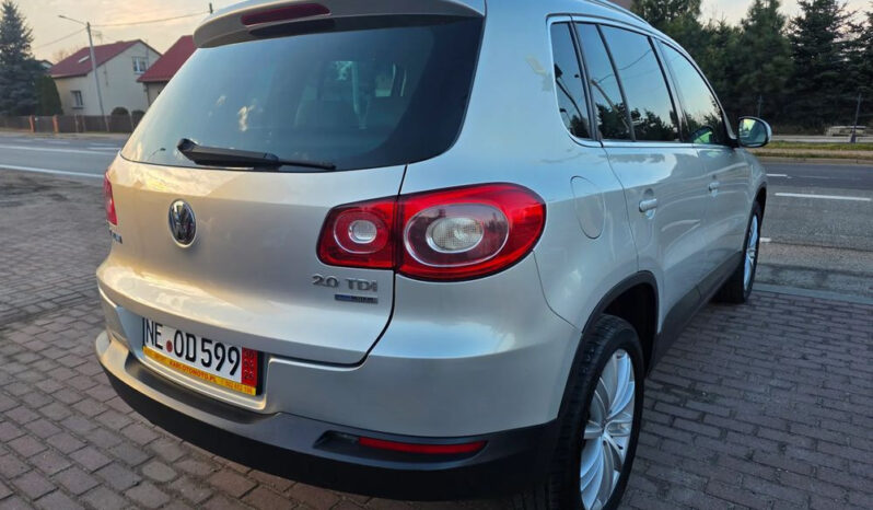 VOLKSWAGEN Tiguan  | FWD (przód) | Manualna | 140 KM | Srebrny full