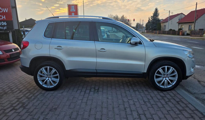 VOLKSWAGEN Tiguan  | FWD (przód) | Manualna | 140 KM | Srebrny full