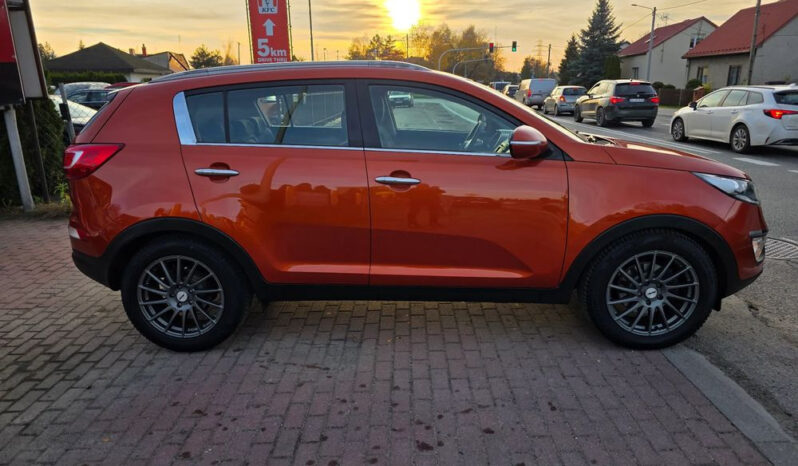 KIA Sportage  | FWD (przód) | Manualna | 135 KM | Pomarańczowy full