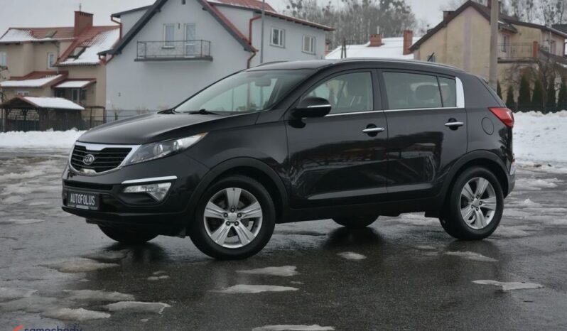 KIA Sportage  | FWD (przód) | Manualna | 115 KM | Czarny full
