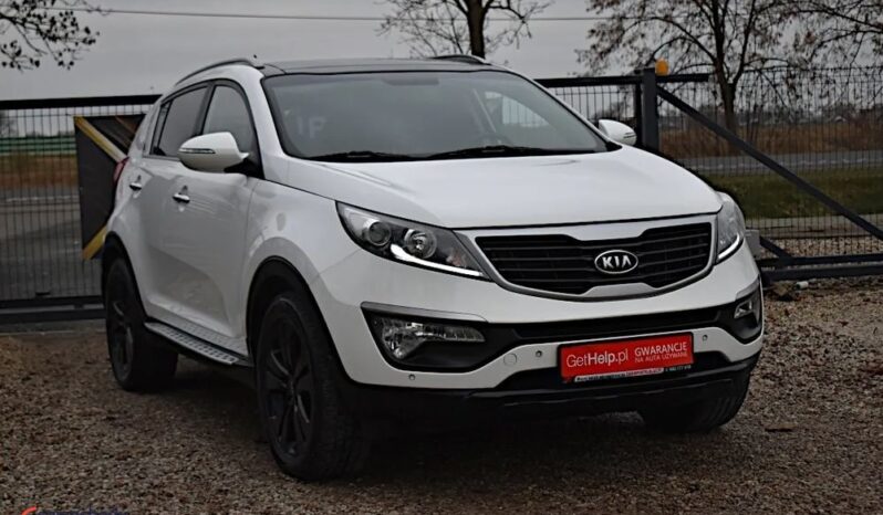 KIA Sportage  | 4×4 (doł. ręcznie) | Automatyczna | 183 KM | Biały full