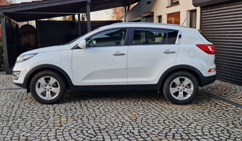 KIA Sportage  | FWD (przód) | Manualna | 115 KM | Biały full