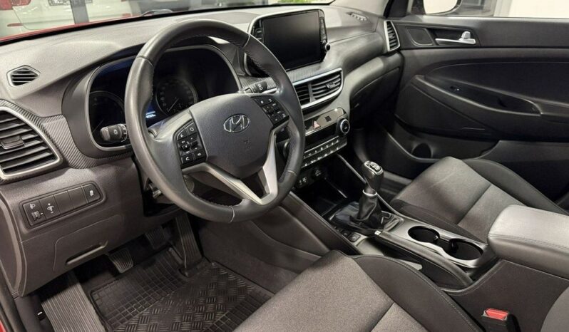 HYUNDAI Tucson  | FWD (przód) | Manualna | 132 KM | Bordowy full