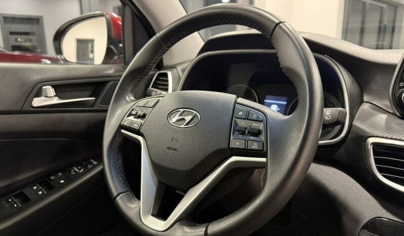 HYUNDAI Tucson  | FWD (przód) | Manualna | 132 KM | Bordowy full