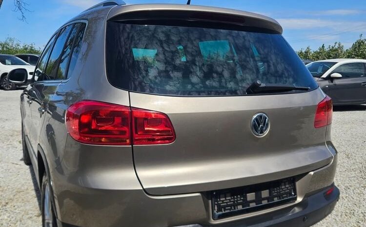 VOLKSWAGEN Tiguan  | FWD (przód) | Manualna | 110 KM | Złoty full