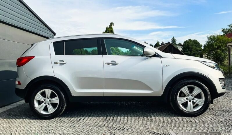 KIA Sportage  | FWD (przód) | Manualna | 135 KM | Srebrny full