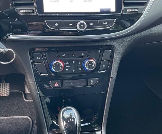 Opel Mokka | FWD (przód) | Manualna | 110 KM | Srebrny full