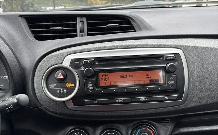 TOYOTA Yaris  | FWD (przód) | Manualna | 69 KM | Czerwony full