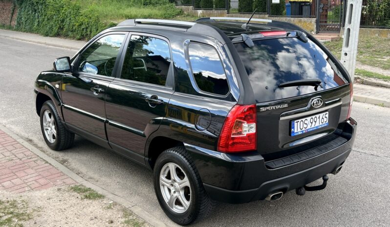 KIA Sportage  | FWD (przód) | Manualna | 140 KM | Czarny full
