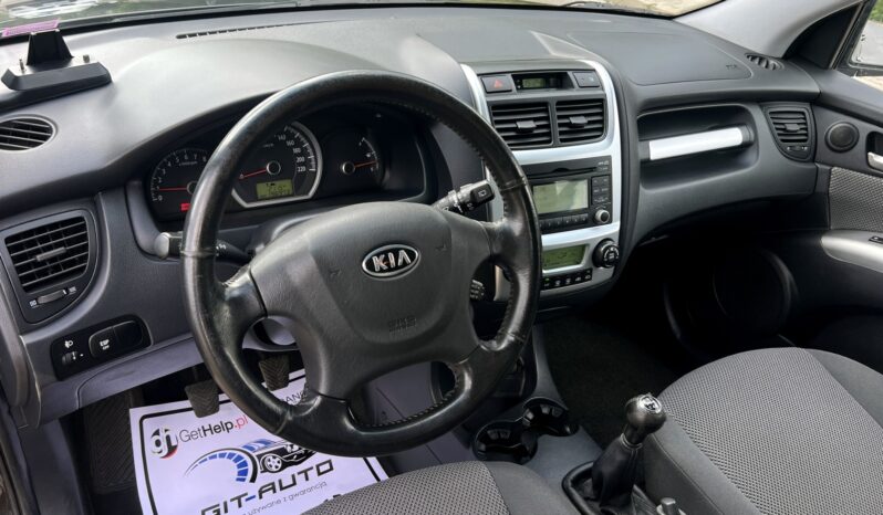 KIA Sportage  | FWD (przód) | Manualna | 140 KM | Czarny full