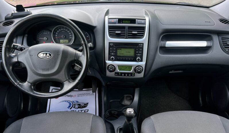 KIA Sportage  | FWD (przód) | Manualna | 140 KM | Czarny full