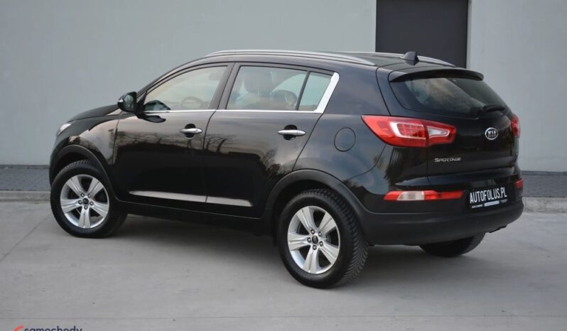 KIA Sportage  | FWD (przód) | Manualna | 115 KM | Czarny full