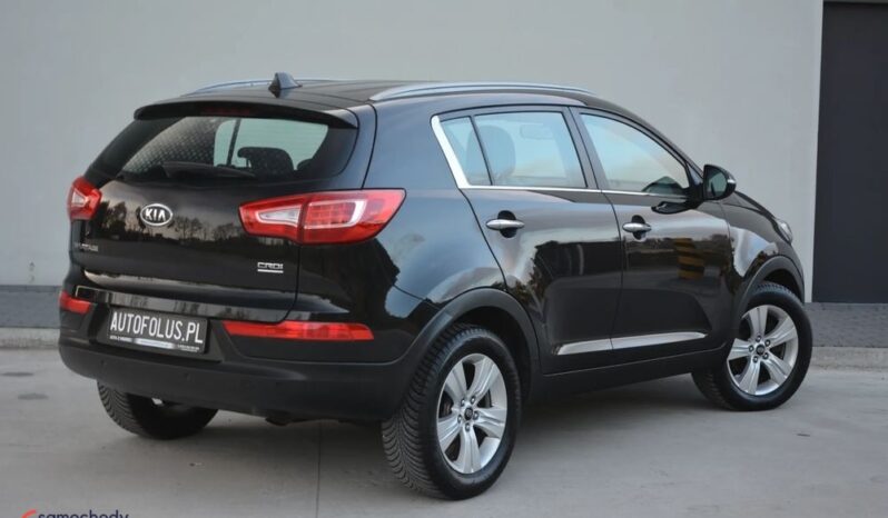 KIA Sportage  | FWD (przód) | Manualna | 115 KM | Czarny full