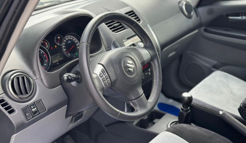 Suzuki SX4 | 4×4 (doł. automatycznie) | Manualna | 120 KM | Czarny full
