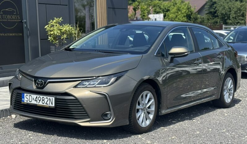 Toyota Corolla | FWD (przód) | Manualna | 125 KM | Brązowy full