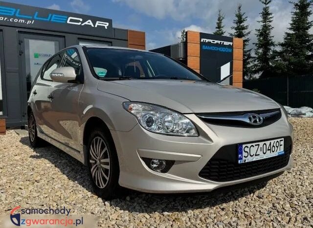 Hyundai i30 | FWD (przód) | Manualna | 90 KM | Beżowy full