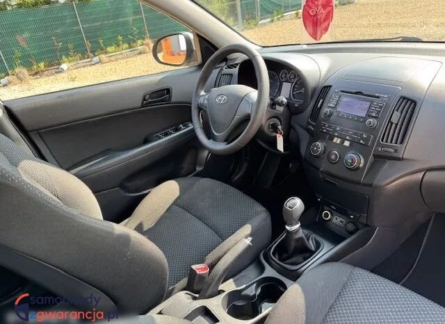 Hyundai i30 | FWD (przód) | Manualna | 90 KM | Beżowy full