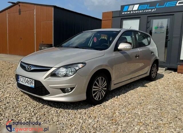 Hyundai i30 | FWD (przód) | Manualna | 90 KM | Beżowy full