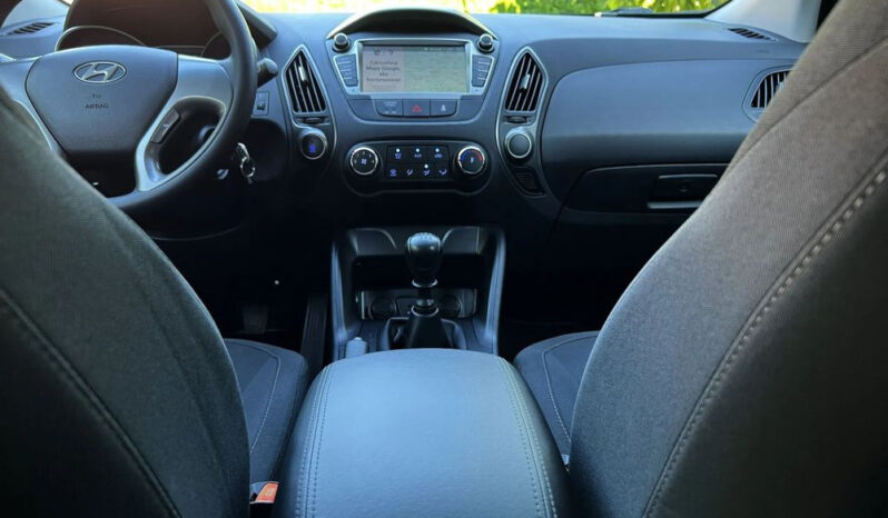 Hyundai ix35 | FWD (przód) | Manualna | 135 KM | Czerwony full
