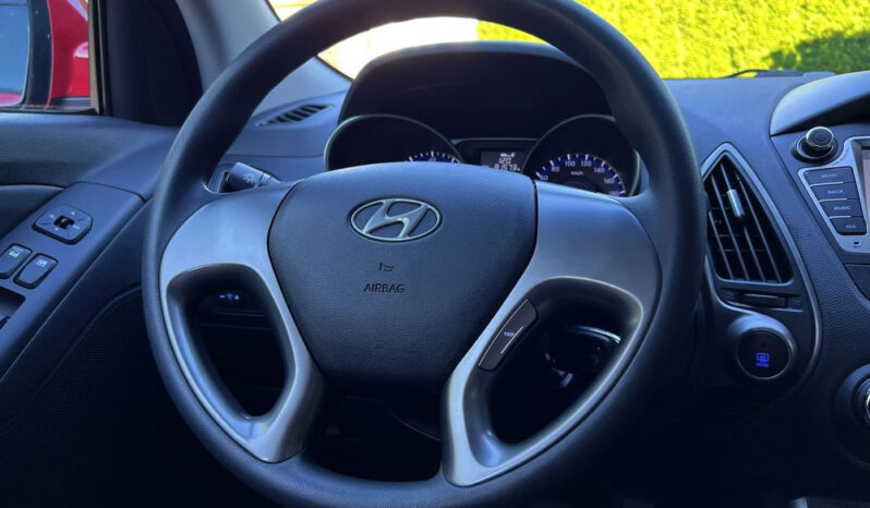 Hyundai ix35 | FWD (przód) | Manualna | 135 KM | Czerwony full