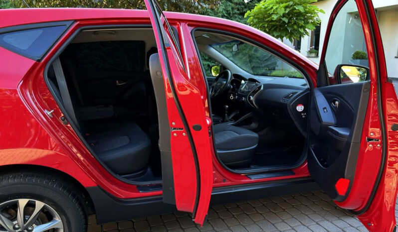 Hyundai ix35 | FWD (przód) | Manualna | 135 KM | Czerwony full