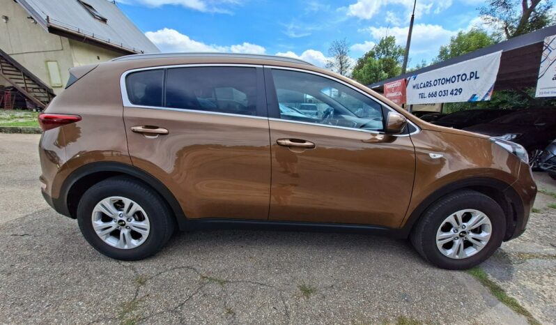 Kia Sportage | FWD (przód) | Manualna | 132 KM | Brązowy full